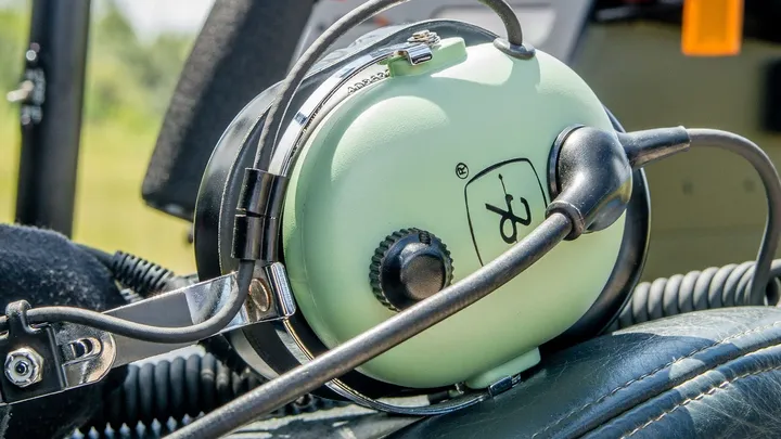 Are headsets provided for communication during flights?