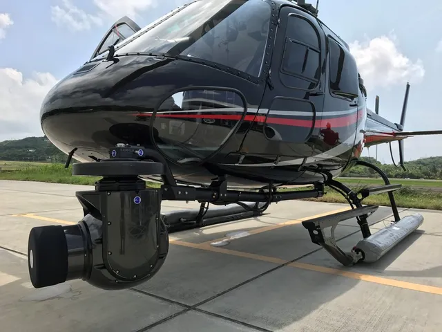 Can I bring photography equipment on a helicopter?