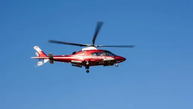 What factors affect helicopter charter pricing?