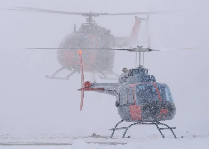 What weather conditions cancel helicopter flights?